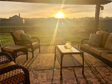 Gorgeous sunrises over looking lake in back.