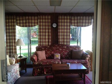 Porch - Enclosed Florida room off of garage