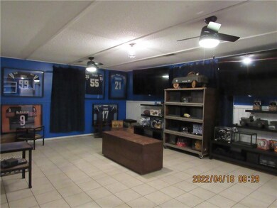 Lower level game room/den
