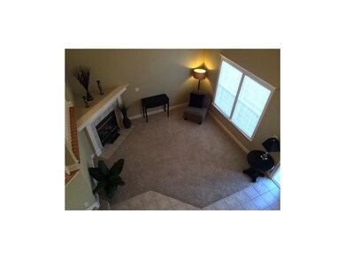 A view of living room from Master Bedroom/hall.  L