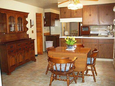 Kitchen. The eat-in kitchen can accommodate many g