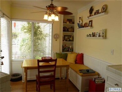 Step down Breakfast Nook with wood floors, ceiling