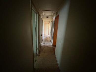 Corridor with concrete flooring