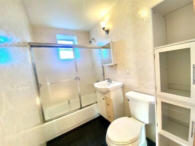 Full bathroom with toilet, shower / bath combinati