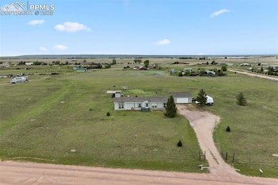 Overview of rural landscape featuring agricultural land