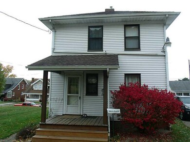 Exterior Back. Back of large home