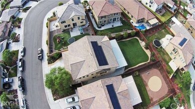 AERIAL VIEW, 14 SOLAR PANELS, FULL LENGTH PATIO CO