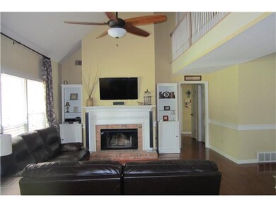 Large open great room has great view of the pool a