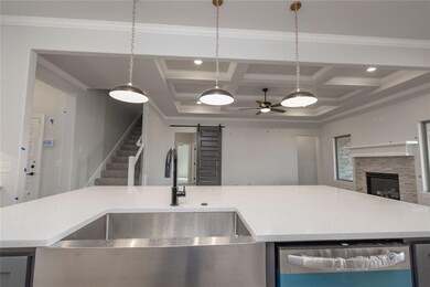 Kitchen with beam ceiling, sink, coffered ceiling,