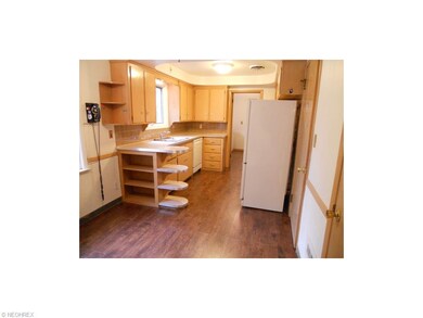 Spacious Eat-in Kitchen with New Laminate Flooring