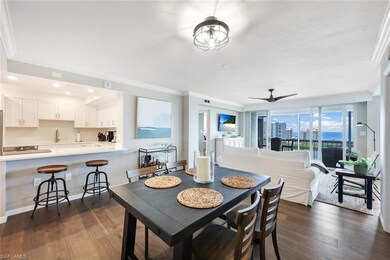 Dining room featuring sink, dark hardwood / wood-s