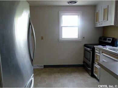 Kitchen. Stainless Steal appliances and sink in ea