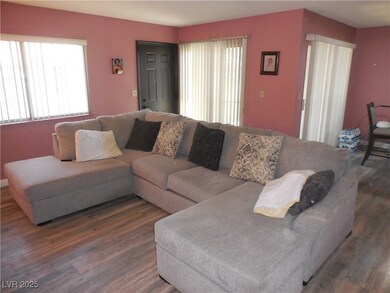 Living room with plenty of natural light and wood