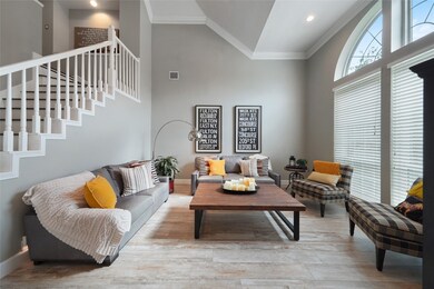 Gorgeous porcelain wood look tile flows through the 1st floor.