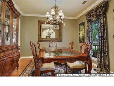 Oversized Formal Dining features beautiful Chandel