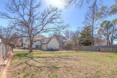 Large backyard with beautiful rod iron from house