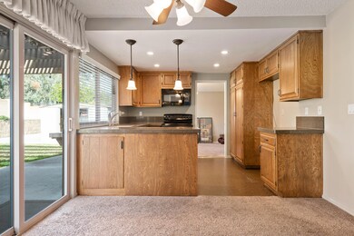 Kitchen opens to back yard