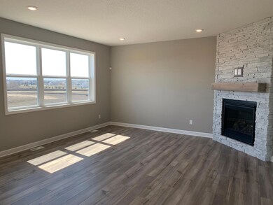 With three huge windows the living room will supply plenty of natural light.