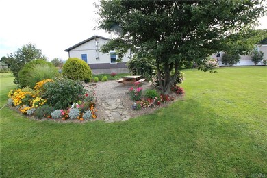 Beautiful gardens surround this entire home with l
