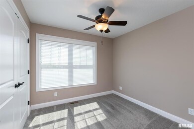 5017 Leprechaun Dr, Davenport, IA 52807 - photo 4