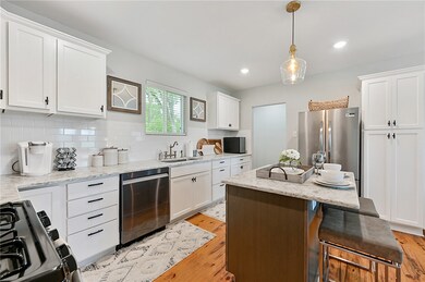 Kitchen featuring light hardwood / wood-style floo