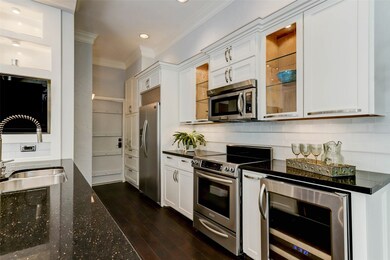 Peninsula island kitchen features a built in flat