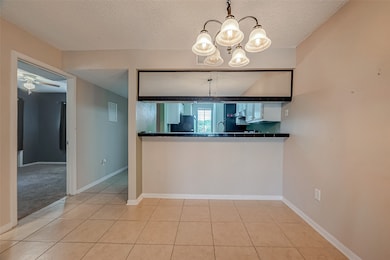 DINING AREA WITH BREAKFAST BAR