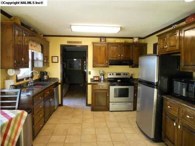 Opposite view of the kitchen.