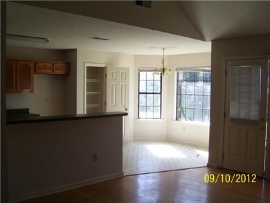 Looking to back of house from front of den