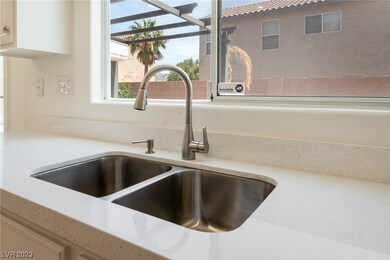 NEW STAINLESS SINK AND FAUCET W/QUARTZ COUNTERTOPS