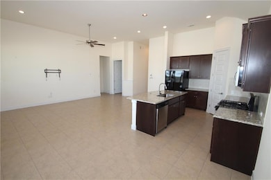 Kitchen featuring appliances with stainless steel