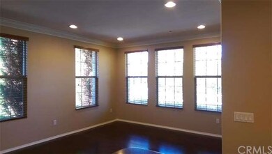 Beautiful living room with recessed lighting, wood