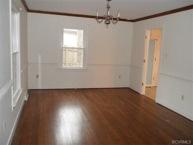 Formal dining room with hardwood floors