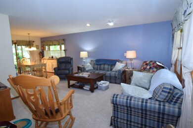 The gathering spot of this home. The living room has a nice window that overlooks the front yard.  There is also easy access to the dining room and kitchen.