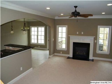 View looking back at the front door.  Exposed stai