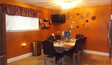 Dining area is open to kitchen.