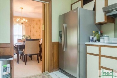 View from the kitchen to the formal dining room.