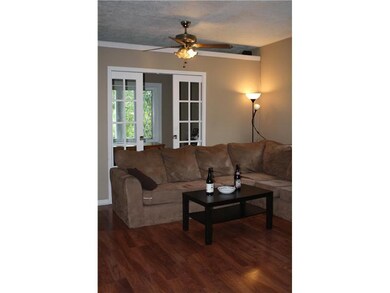 Living Room. Spacious living room with exposed bri