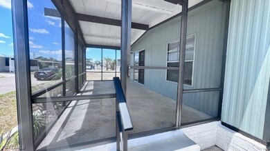 Unfurnished sunroom featuring beamed ceiling
