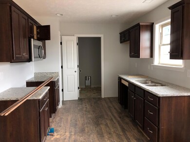 Kitchen will have Stainless Steel Dishwasher, Stove & Microwave abouve Stove