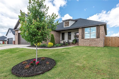 Gorgeous front with landscaping & eve lighting!
