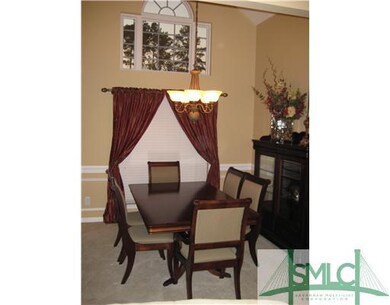 Dining Room. Dining room with wainscoating and att