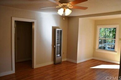 Good sized family room with new heater, French doo