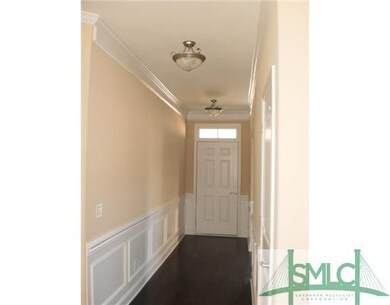 Foyer. LOTS OF MOLDING, HARDWOOD FLOORING!