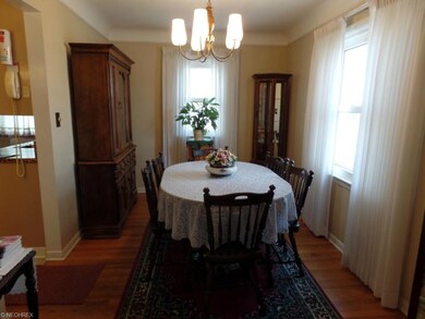 Dining room with room for large table and hutch. Kitchen to the left.