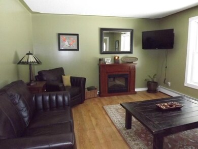 Living room with hardwood flooring