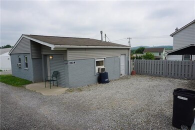Alley View of Rear Unit with parking spot