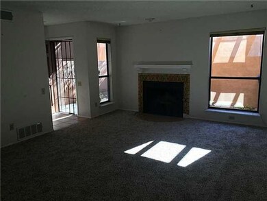 Living room with fireplace new carpet