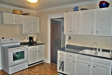 Kitchen measures 12x11.  Refrigerator, stove and dishwasher remain with home.
