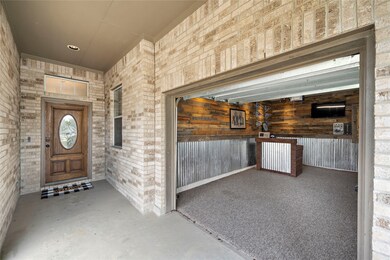 This garage is used as a mancave but can still be used to park your car in.